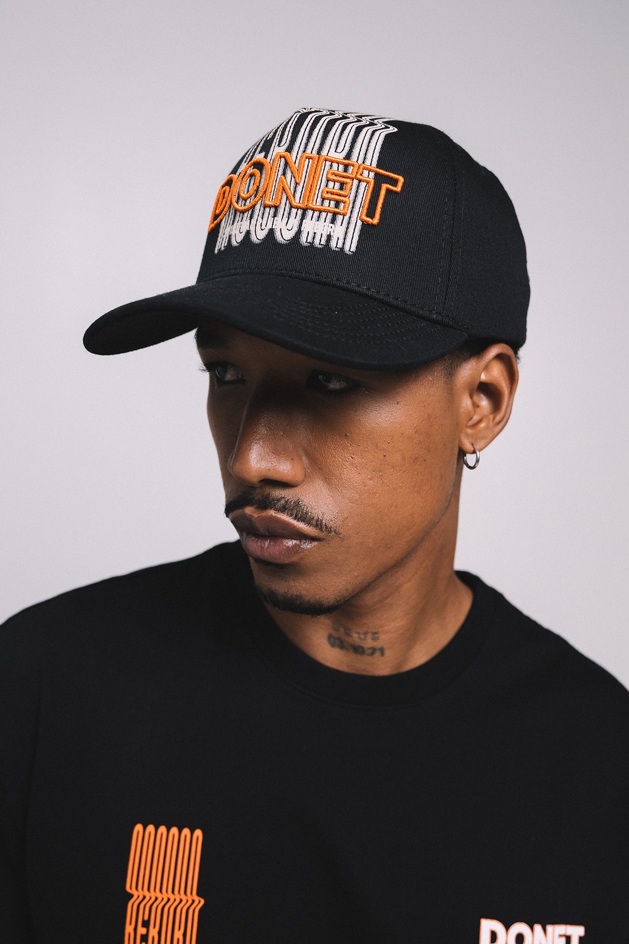 CAP REBORN BLACK ORANGE